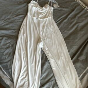 Off white romper.brand new with tags.